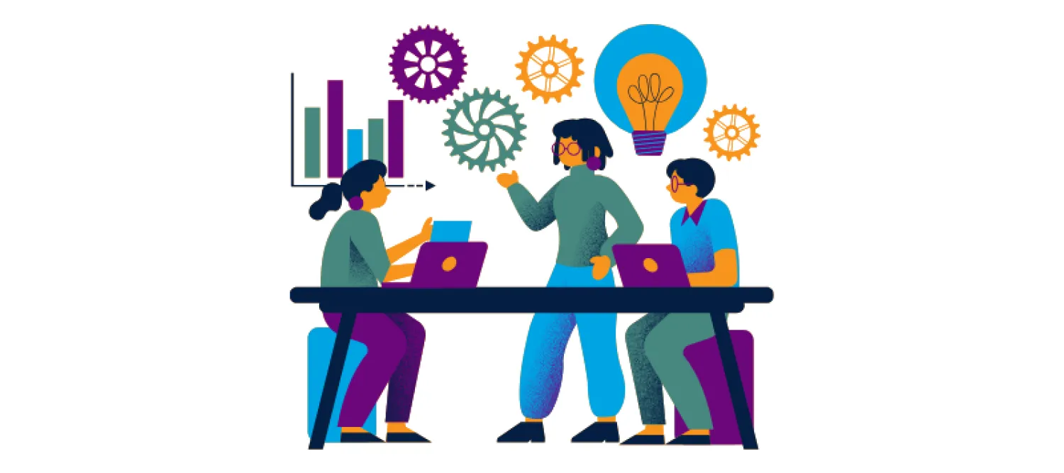 Researchers coming up with an idea around a table