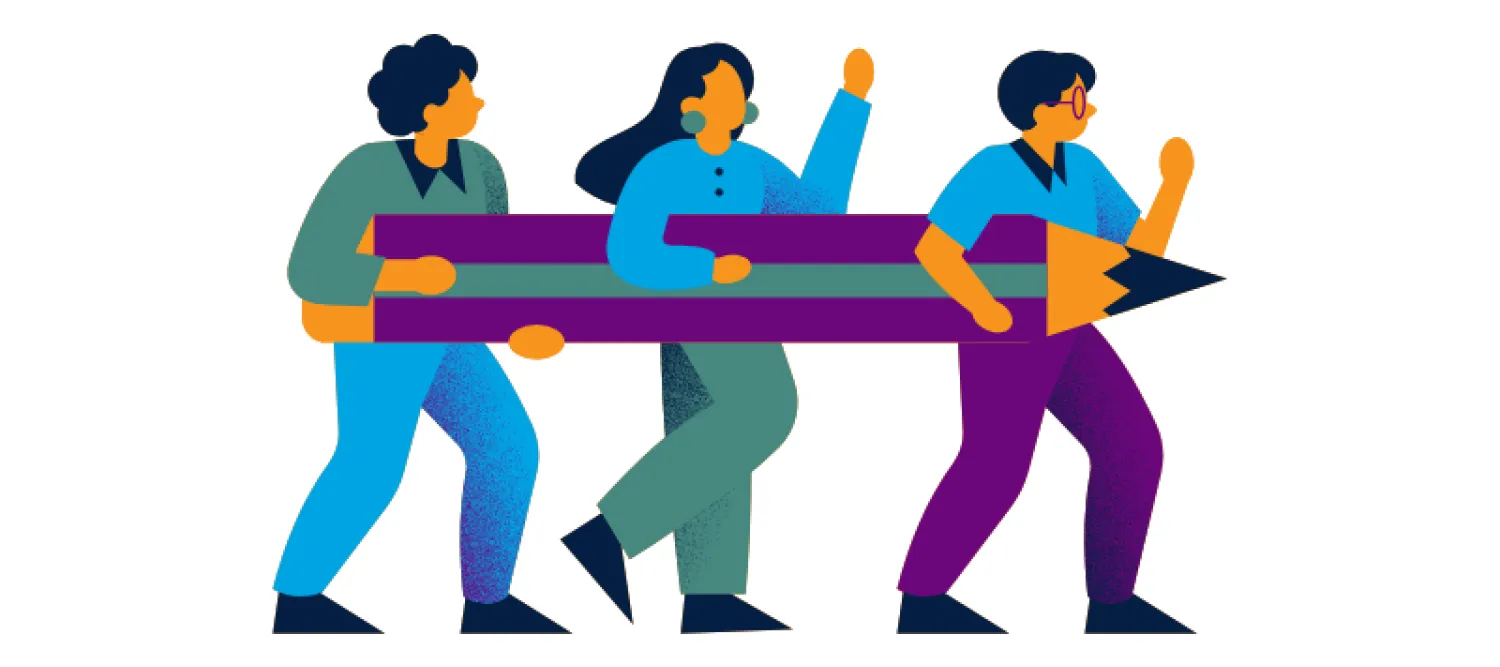 Researchers and a large pencil