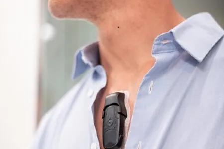Patient wearing a holder monitor