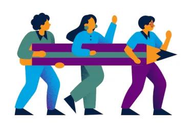 Researchers and a large pencil